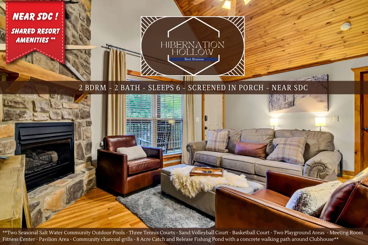 This interior image features a cozy stone fireplace as the focal point, with comfortable seating thoughtfully arranged to foster conversation and relaxation. A glimpse of the screened-in porch hints at indoor-outdoor living. The setting radiates warmth and togetherness, inviting guests to gather for stories, games, or quiet evenings by the fire.